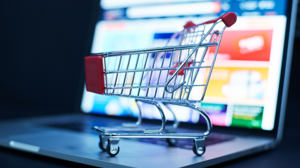 shopping cart with a website in the background