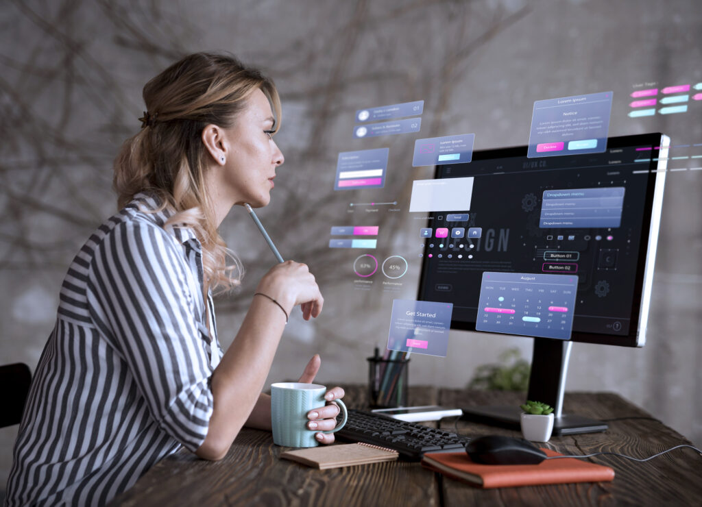 woman looking at the computer checking ux and ui